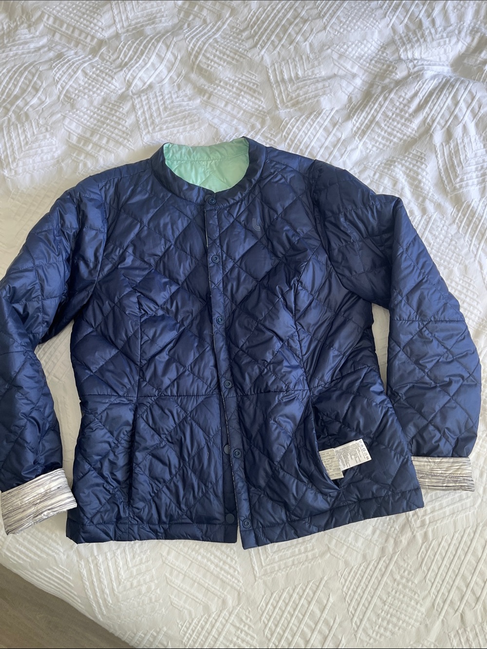 Lole Reversible Quilted Puffer Jacket in Navy with Mint Lining